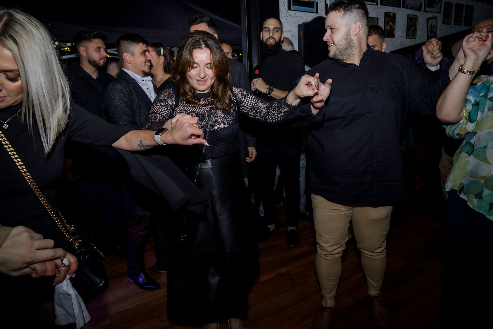 Guests dancing during a celebration at Toro Negro