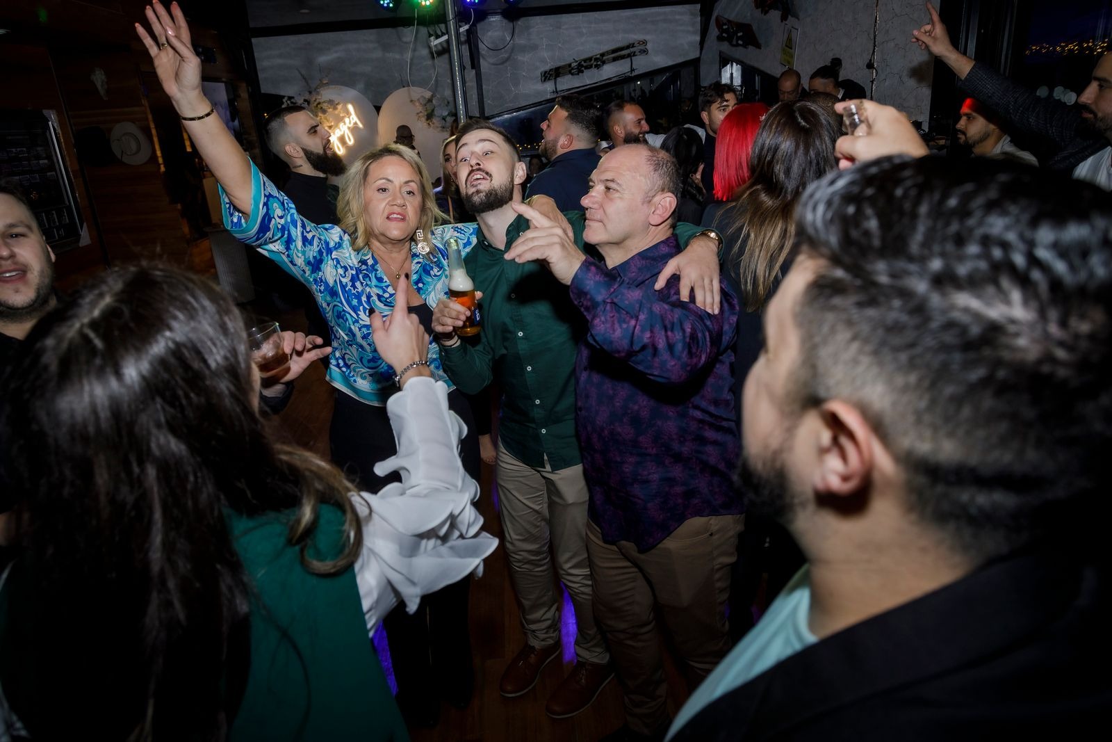 Guests celebrating with music at Toro Negro